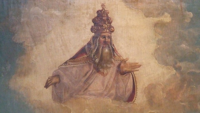 Das Bild zeigt einen König mit Krone und langem Bart, der auf Wolken sitzt.