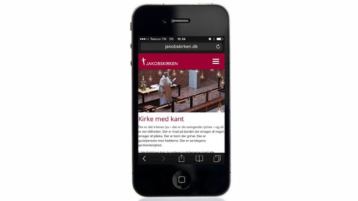 Smarttelefon med nyhedsartikel om Jakobs kirke