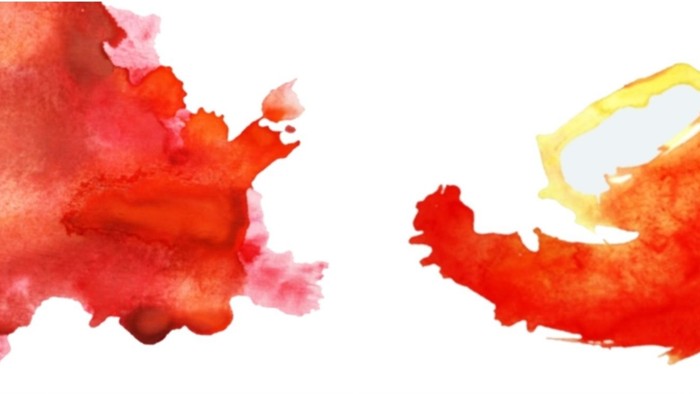 Abstrakte Aquarellflecken in warmen Rottönen, Orangen und Pink auf weißem Hintergrund.