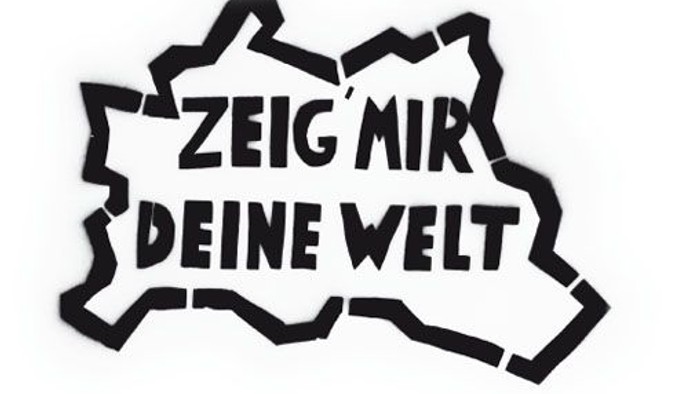 Das Bild zeigt einen stilisierten Umriss von Österreich mit dem Text „ZEIG MIR DEINE WELT“.