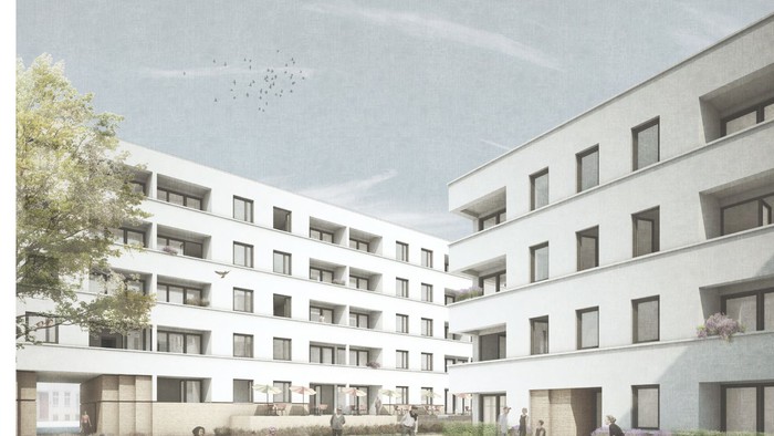 Modernes Wohngebäude mit Innenhof und grünen Bereichen