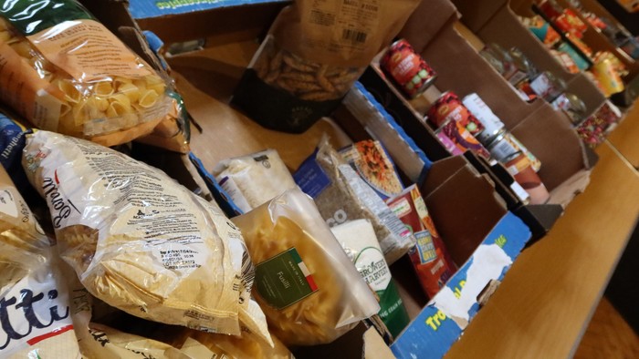 Assorted food items and boxes on a table