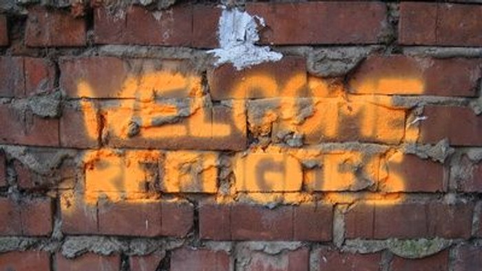 Graffiti auf Ziegelmauer