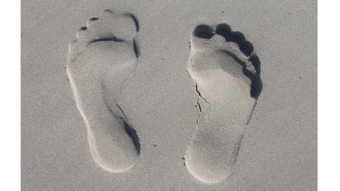 Fußabdrücke im Sand