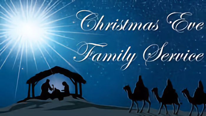 Christmas Eve Family Service with nativity scene and camels under starry night