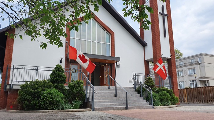 Church with Canadian flags.