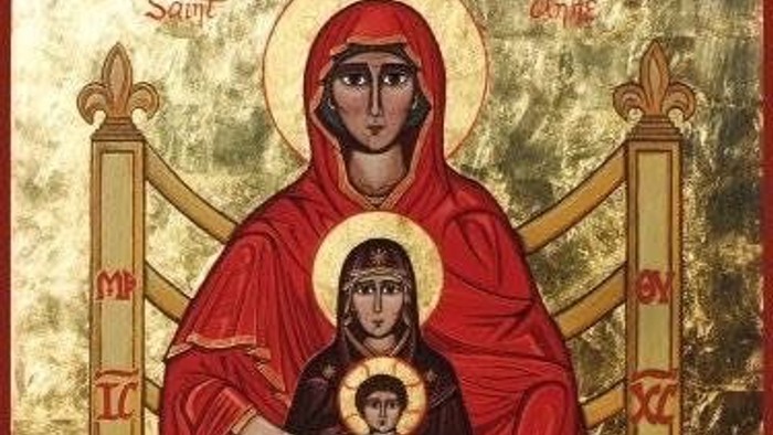 Religious icon depicting the Virgin Mary holding baby Jesus, seated on a throne.