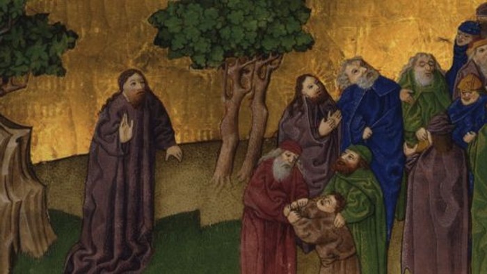 Billedet viser en religiøs scene med flere figurer i traditionelle klæder i en skogmiljø.