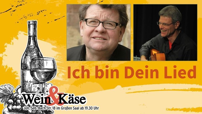 Bild zeigt zwei Männer und eine Weinflasche mit dem Text "Ich bin Dein Lied"