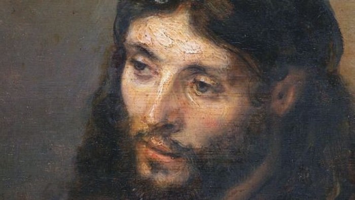 Et oljemaleri af en mand med lang barbe og hår, der ser tænkende ud.