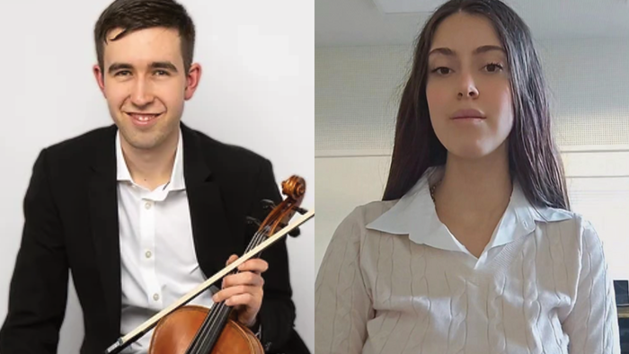 Ein Mann mit Geige und eine Frau in Bluse