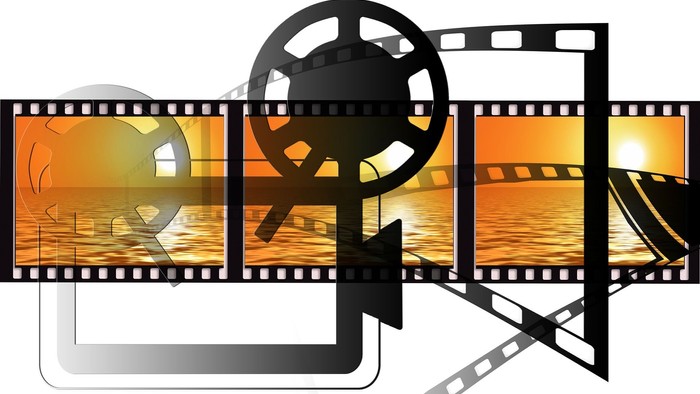 Filmmateriale med solnedgang og filmrulle