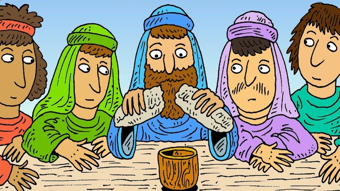 Fünf Personen sitzen an einem Tisch und essen Brot.