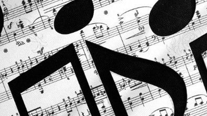 Sorte og hvide musikalske noter og symboler