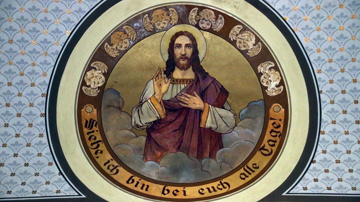 Das Bild zeigt eine religiöse Darstellung von Jesus Christus mit einem deutschen Zitat.