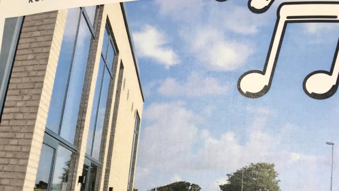 Reklameplakat for et nybyggede musikcenter