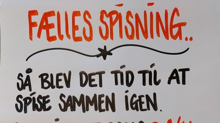 Plakat med information om fælles spising