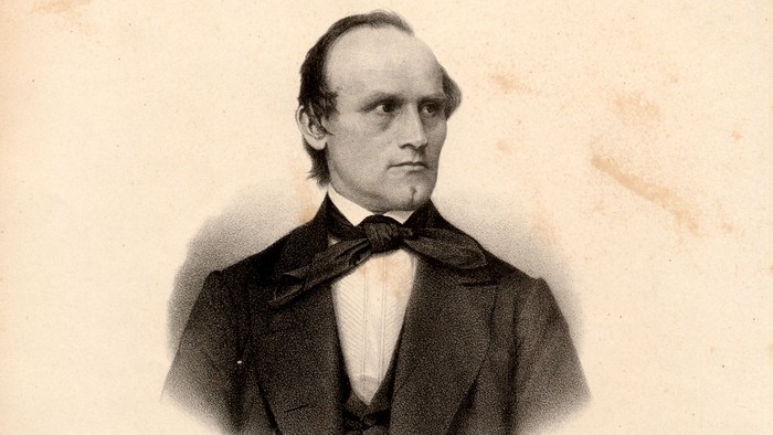 Porträt eines formell gekleideten Herrn mit Fliege, beschriftet mit „Henry Thirl“ in eleganter Schrift.