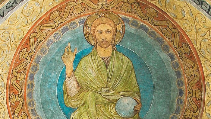 Das Bild zeigt eine religiöse Darstellung von Jesus Christus mit einer Weltkugel.