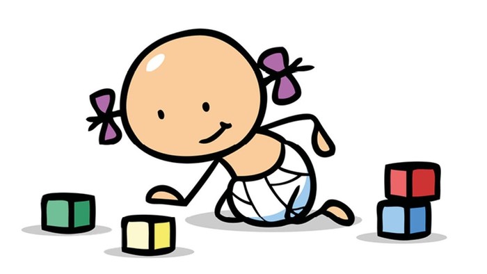 Ein Baby spielt mit bunten Würfeln.