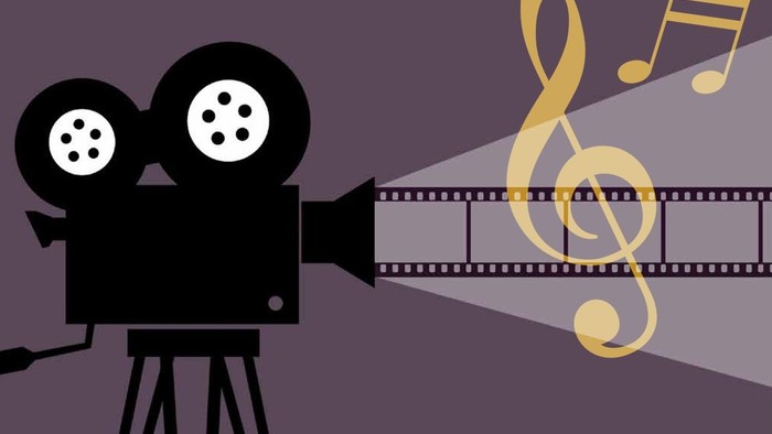 Filmkamera projiziert Noten auf Filmstreifen