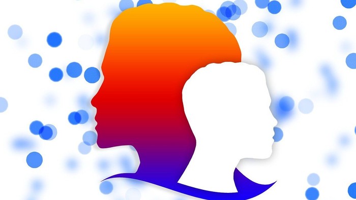 Ein bunter Kopf mit Haar in Regenbogenfarben vor blauem Hintergrund mit Punkten