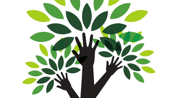 Håndskærm om træ med grønne blade