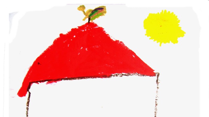 Ein buntes Haus mit rotem Dach und einem gelben Sonnen.