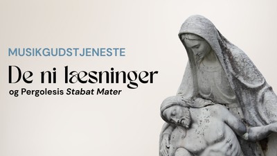 Statue af Jomfru Maria, der holder babyen Jesus, med dansk tekst
