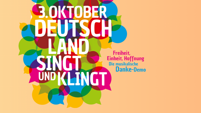 Colorful graphic celebrating German Unity Day with text and festive elements