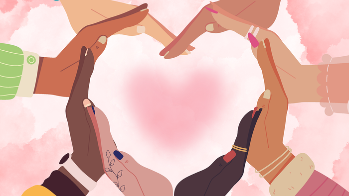 Forskelligfarvede hænder former et hjerte.