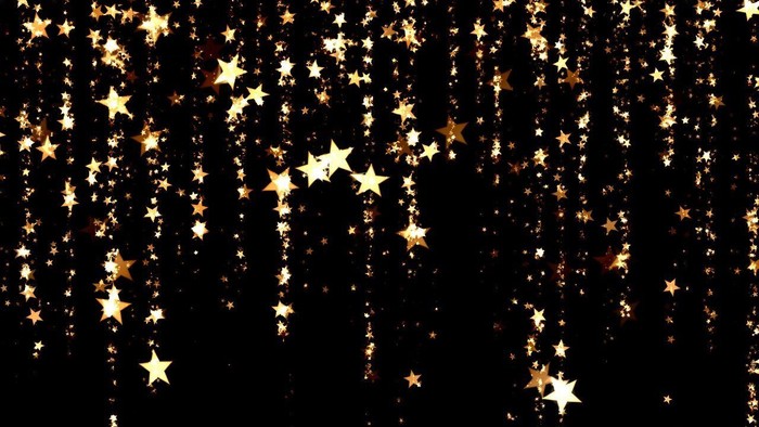 Goldene Sterne auf schwarzem Hintergrund