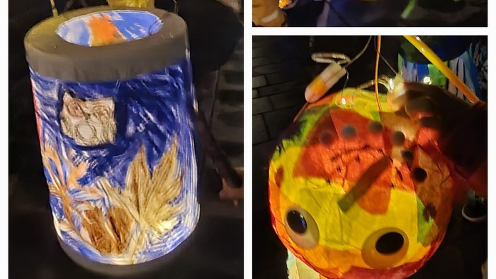 Bunte Laternen und Kostüme bei einer nächtlichen Veranstaltung