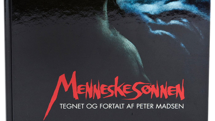 Bog med portræt af Peter Madsen