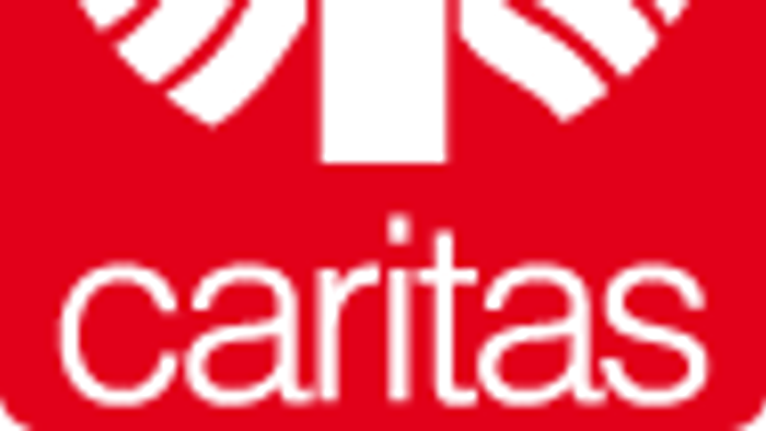 Das Bild zeigt ein rotes Logo mit einem weißen Kreuz und dem Wort