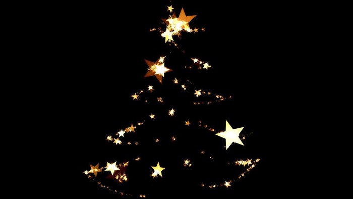 Ein Weihnachtsbaum aus leuchtenden Sternen vor schwarzem Hintergrund