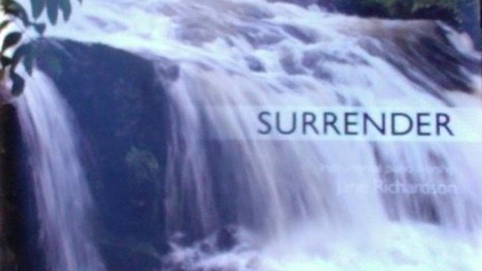 Waterfall with lush greenery, text 