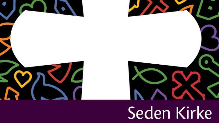 Et hvidt kors på farverig baggrund med teksten 