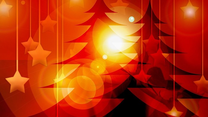 En festlig juledecoration med lysende stjerner og træer i varme orange og røde farver