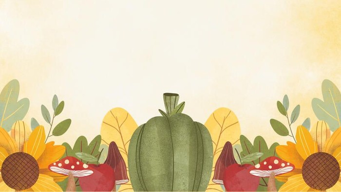 Herbstliche Dekoration mit Kürbis, Pilzen und bunten Blättern