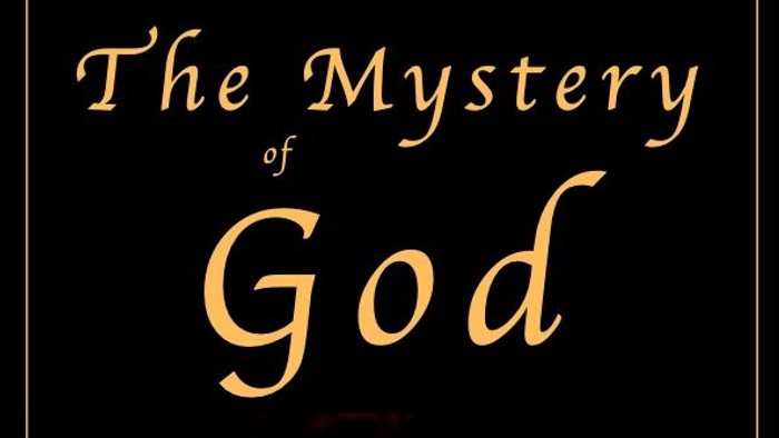 The image features a book cover titled 'The Mystery of God' with a candle held in hands, set against a dark background.
