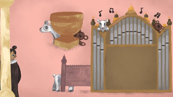 Billedet viser en orgel, en kæmpe og et tårn