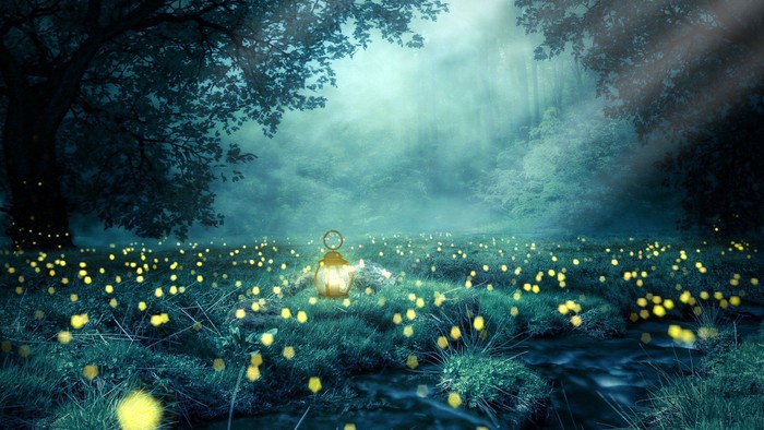 Ein Kind sitzt in einem leuchtenden Feld aus Feuerwerkskörpern im Wald bei Nacht