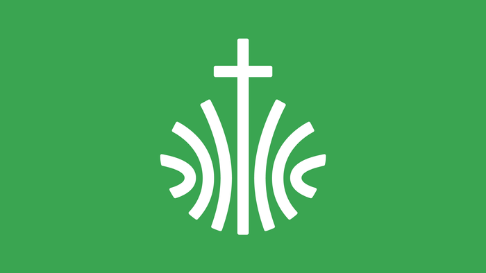 Das Bild zeigt ein weißes Kreuz mit Wellenlinien auf grünem Hintergrund