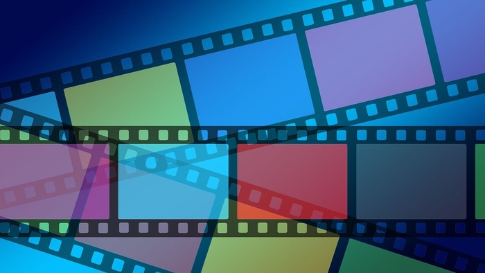 Bunte Filmstreifen in Überlappung, abstraktes Design