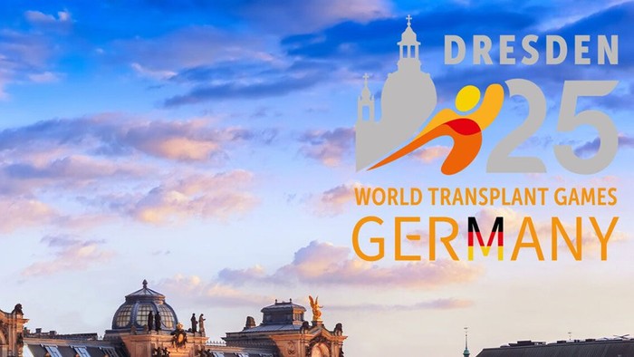 Das Bild zeigt den Dresdner Dom bei Sonnenuntergang mit dem Logo der World Transplant Games Deutschland.
