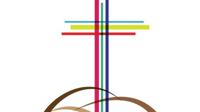 Buntes Kreuz mit Wellenfuß