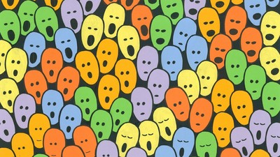 Billedet viser en mængde farvede spøgelsesansigter.