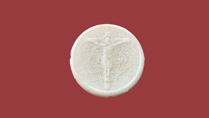 Oblat med Jesus på korset