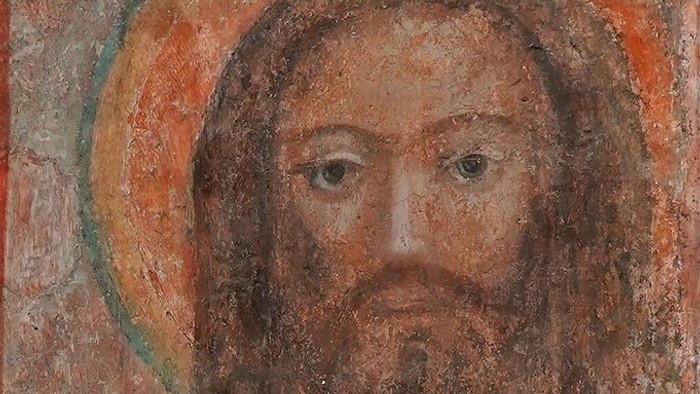 Das Bild zeigt ein altes, religiöses Gemälde eines Mannes mit Heiligenschein.